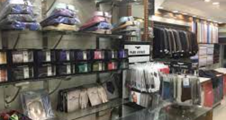 K C TAILORS AND DRAPERS
